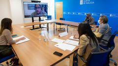 Un momento de la reuni�n por videoconferencia entre el ministro de Mar de Portugal, ahora presidente del Consejo de Ministros de Pesca de la UE, y la conselleira de Mar Rosa Quintana