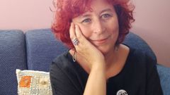 � tam�n poeta, autora de obras de ensaio e acad�mica da RAG