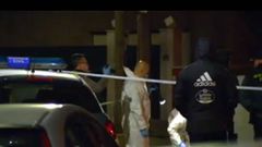 Miembros de la polic�a y forenses en el lugar del crimen de Baiona