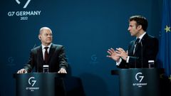 El canciller Olaf Scholz y el presidente Emmanuel Macron, durante la rueda de prensa de la noche del martes.