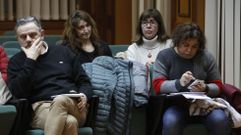 Las dos representantes de Femforte, con gesto serio en el pleno tras la votaci�n