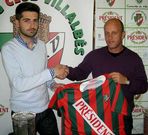 P�ez, a la izquierda, d�ndole la mano a Francisco Ruiz.