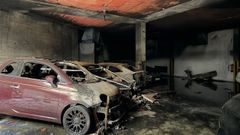 Veh&iacute;culos afectados por el incendio del garaje en Ciudad Escolar