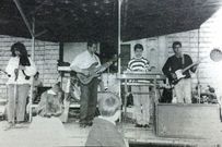 Los cuatro componentes de Brigancia en 1991, durante un concierto en Monforte