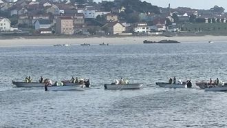 Marineros faenando en la ra de Arousa