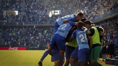 Los jugadores del M�lagra celebran un gol en La Rosaleda