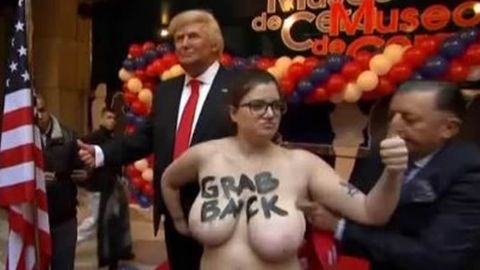 Las Femen protestan en la presentaci�n de la figura de cera de Trump en Madrid