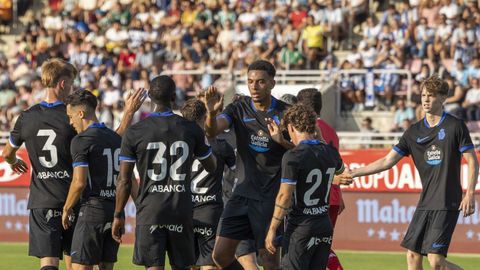 Los jugadores del Deportivo, celebrando un gol anotado en San L�zaro.