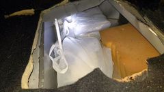 Bolsas de coca�na ocultas en una caleta practicada en un autom�vil que usaba la red