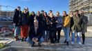 Socios de la cooperativa coruesa A Luzada, en la parcela de Xuxn donde construyen un edificio de 32 viviendas en una parcela pblica cedida por la Xunta durante 60 aos en rgimen de alquiler social, con una subvencin europea y un prstamo de la banca tica Fiare.