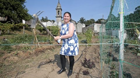 Lucy Dalia Andino, en el huerto de la oeneg� Boa Vila en el que produce hortalizas para su autoconsumo. 