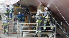 Trabajadores de auxiliares en la botadura de la fragata Bonifaz.