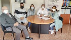 Firma del acuerdo de colaboraci�n entre representantes de las dos entidades