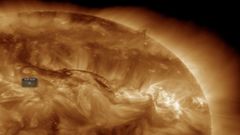 Tama�o del filamento que lleg� el pasado martes en comporaci�n con las dimensiones de la Tierra