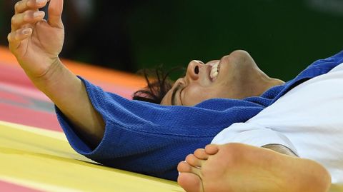 El yudoca japon�s Masashi Ebinuma durante su combate contra el brasile�o Charles Chibana.