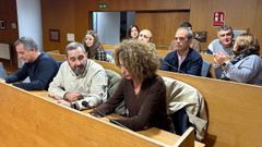 P�o Mill�n y la portavoz popular, Dolores Hermelo, en un pleno