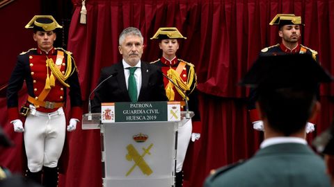 El ministro del Interior en funciones, Fernando Grande Marlaska, interciene en el acto conmemorativo de la festividad de la patrona de la Guardia Civil, la Virgen del Pilar, celebrado en Huesca el pasado d�a 6