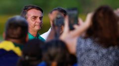 Jair Bolsonaro, rodeado de seguidores, el pasado mes de diciembre