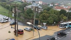 Inundaciones con el chal� de San Rom�n de fondo