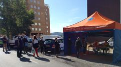 Carpa instalada en el barrio del Malvar�n para el reparto de mascarillas sanitarias