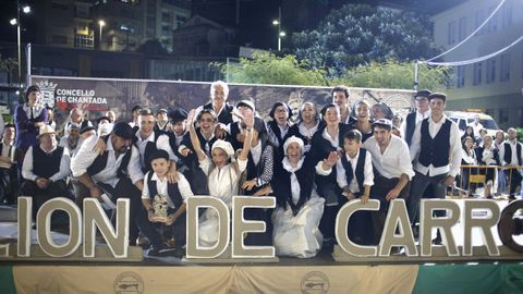 Los ganadores celebran el premio del foli�n en el palco