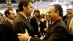 Ram�n Vigo saluda a Alberto N��ez Feijoo en Fitur