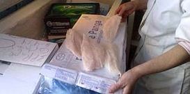 Filetes de panga congelados dentro de sus estuches