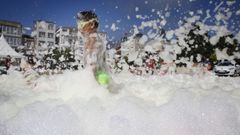 �Mira aqu� las im�genes de la fiesta de la espuma del Nazareno!