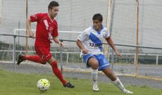 El Sporting Burgo (de rojo) contra el Pastoriza. 