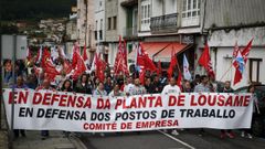 Los organizadores apuntaron que al acto de protesta acudieron unas trescientas personas. 