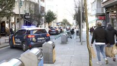 Un veh�culo de la Polic�a Nacional, patrullando por el Ensanche de Santiago