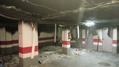 Un doble incendio causa graves da�os en un aparcamiento de O Milladoiro
