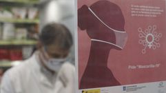 El cartel de la campa�a, en una farmacia de Ourense