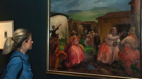 Alicia Vallina frente a la Carnavalada en la cuenca minera (1932) de Evaristo Valle en el Museo de Amrica