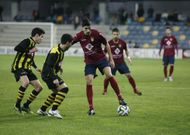 Anxo, con el bal�n, durante el partido de la primera vuelta en el municipal de Pasar�n. 