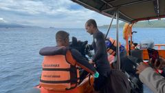 Buzos que participan en la b�squeda de los desaparecidos