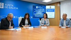 El alcalde de Muíños y la conselleira de Vivenda rubricaron el convenio para recuperar una edificación municipal