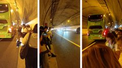 Instant�neas tomadas por usuarios del bus con los viajeros apeados en pleno t�nel de la autopista