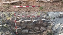 Restos de los muros hallados durante los trabajos de regeneraci&oacute;n del arenal