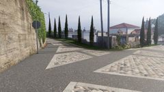 Acceso a la Escola Municipal de Gusamo, en Bergondo