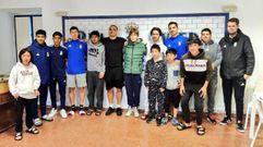 El joven ucraniano, en el centro, en las instalaciones del Real Oviedo en FUNDOMA