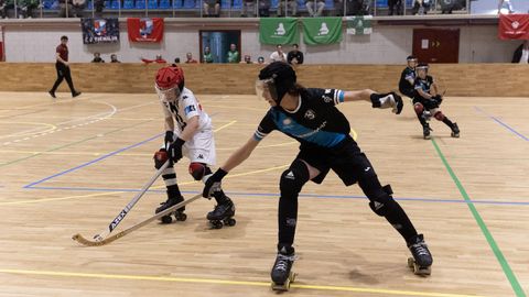 Jugada durante la semifinal entre DOminicos y Lubi�ns