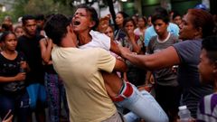 Al menos 68 muertos en un mot�n en unos calabozos de la polic�a en Venezuela