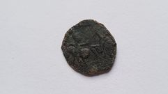 Moneda romana encontrada en el castro de A Cividade, en San Xurxo de Sacos, Cerdedo-Cotobade