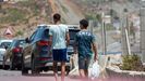 Dos menores migrantes en Ceuta, a finales de julio.