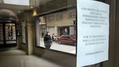 Comercios cerrados con carteles que advierten que seguir�n as� mientras se prolongue la alerta sanitaria