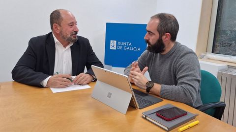 Merelles recibi� a Juli�n Bustelo en Santiago.