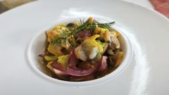 Un plato preparado a base de berberechos.