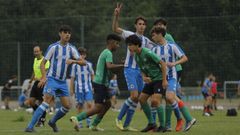 Jugadores del cadete de Divisi�n de Honor del Deportivo durante un partido de la pasada temporada