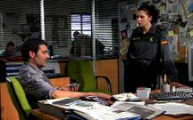 El periodista Vargas y la teniente Seijas.
